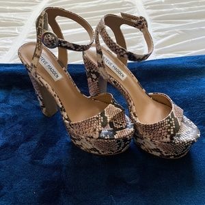 Platform snake print heels